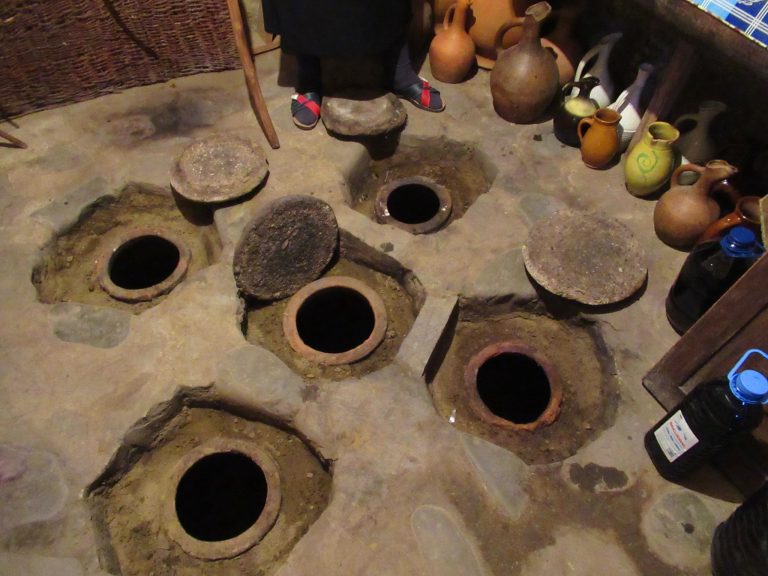 Ancient Georgian traditional Qvevri wine-making method - clay barrels sealed and buried in the ground so that the wine can ferment for five to six months.