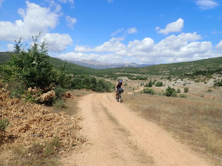 Stunning cycling on viewing plateau between Great and Small Prespa Lakes.